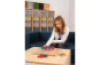 Wooden board with screws
