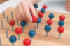 Wooden board with screws