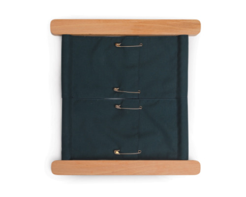 Montessori Aid. Exercise frame with safety pins