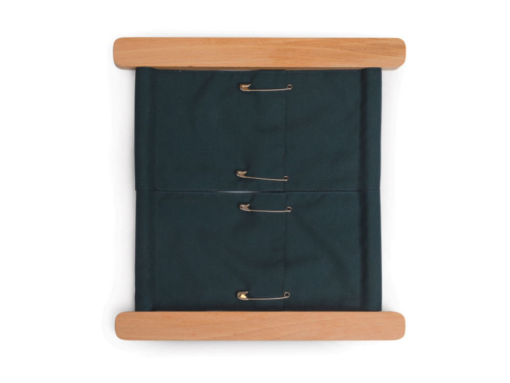Montessori Aid. Exercise frame with safety pins