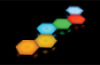 Illuminated colourful wall panels. Honeycombs