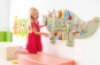 Dinosaur wall manipulation board