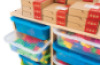 Maxi mobile cabinet with bricks and plastic containers