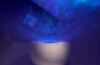 Ocean wave projector with sounds and speaker.