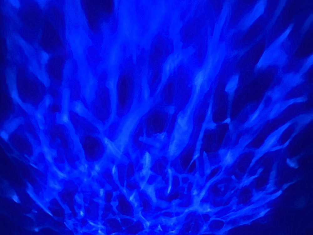 Ocean wave projector with sounds and speaker.