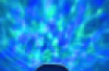 Ocean wave projector with sounds and speaker.
