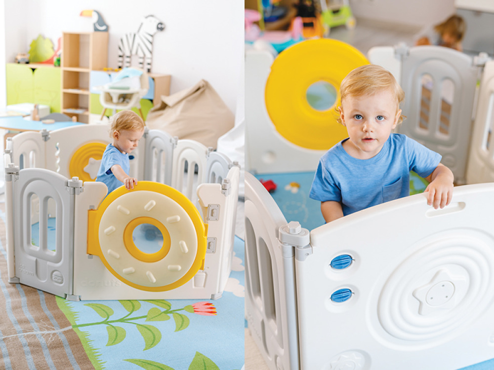Pastel playpen with manpulative elements