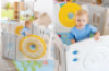 Pastel playpen with manpulative elements