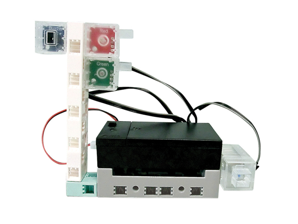Educational kit with a robot, worksheets and lesson scenarios