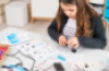 Educational kit with a robot, worksheets and lesson scenarios
