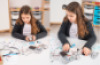 Educational kit with a robot, worksheets and lesson scenarios