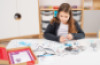 Educational kit with a robot, worksheets and lesson scenarios